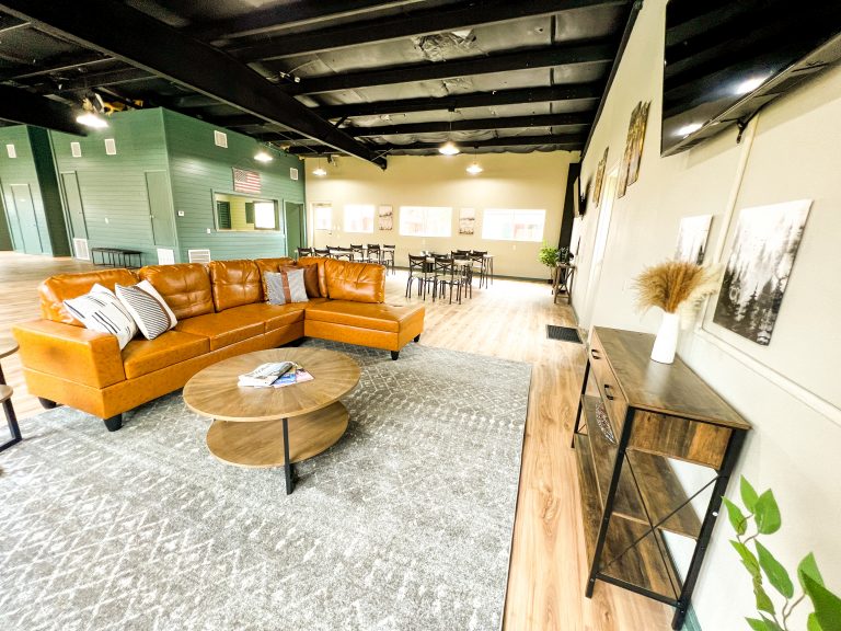 sitting area with brown couch in REC building