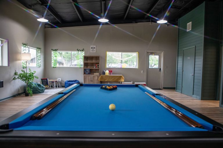 blue pool table inside a Rec room